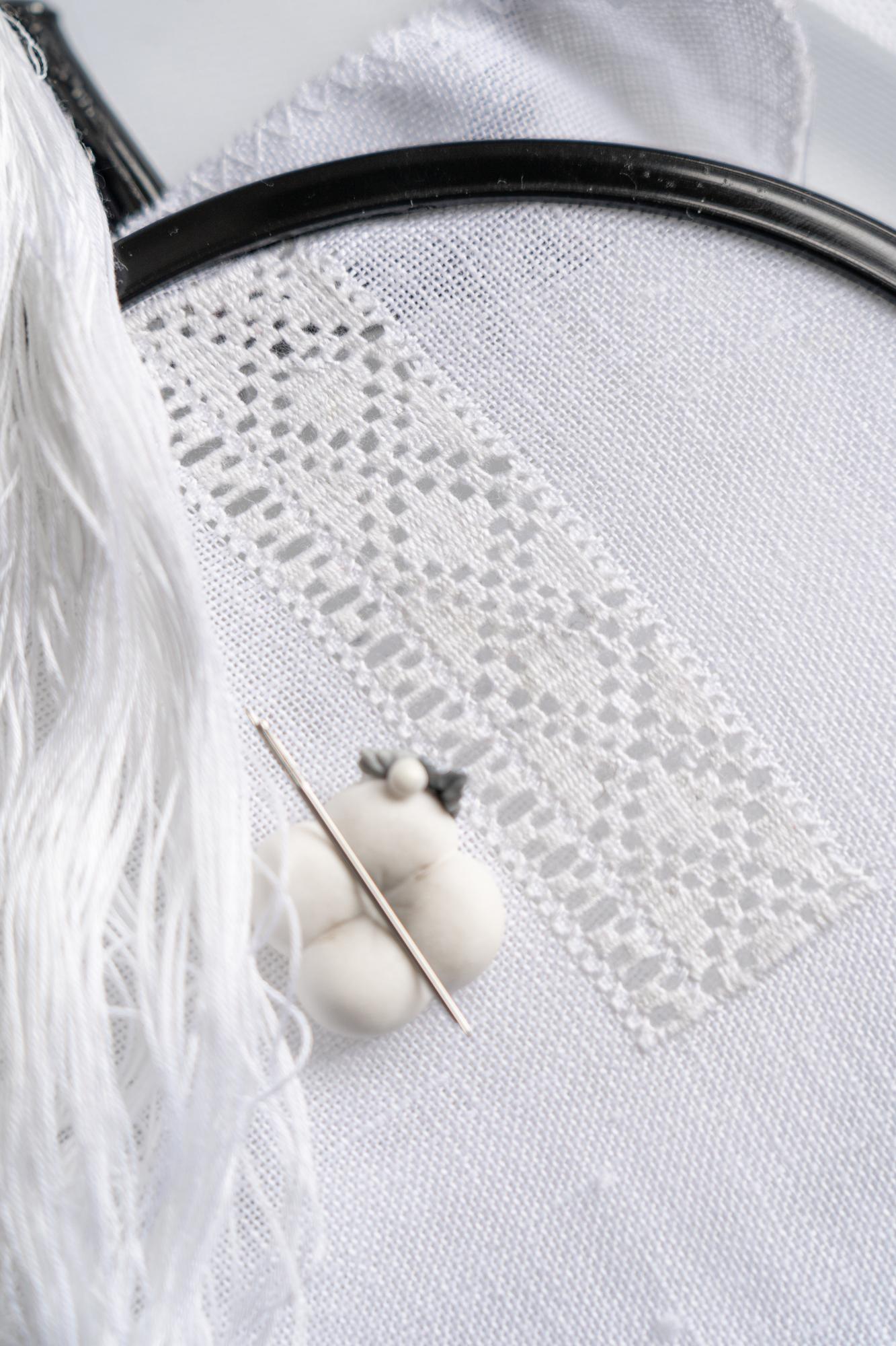 detailed floral stitch on cotton shirt cuff